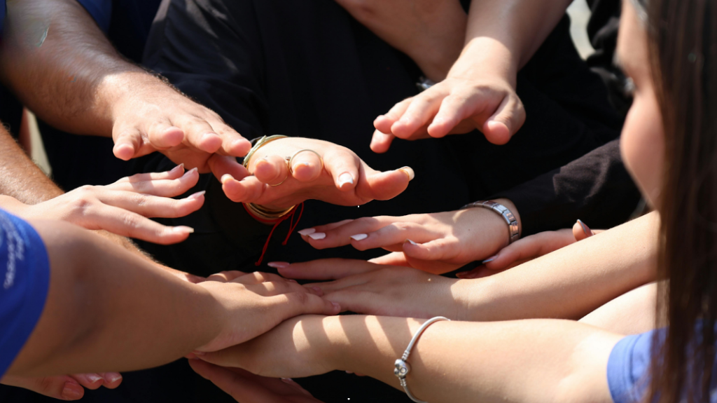 Human Support Team Hands Together